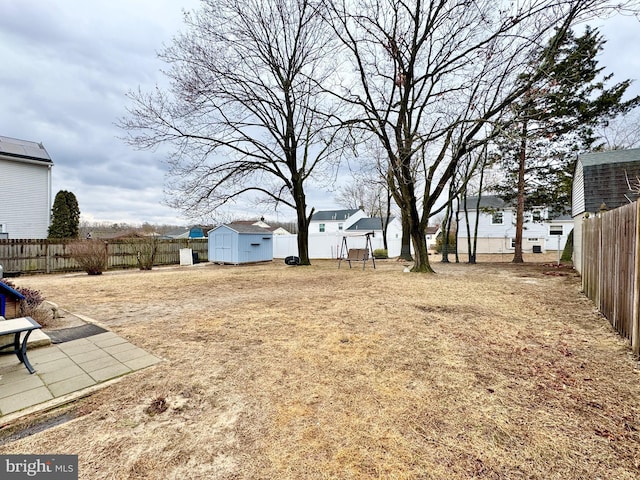 view of yard with a shed