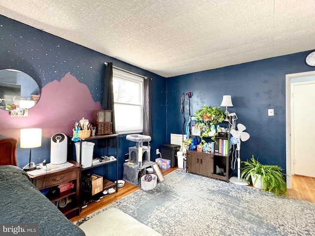 bedroom with wood-type flooring