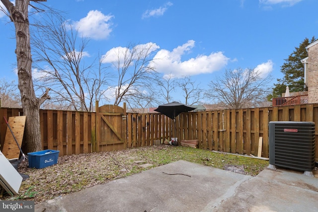 view of yard with a patio and cooling unit