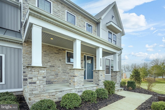 doorway to property with a porch