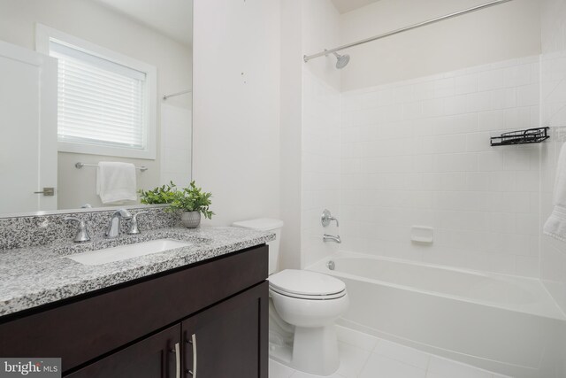 full bathroom featuring vanity, tile patterned flooring, bathtub / shower combination, and toilet