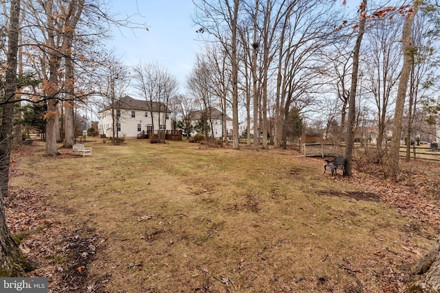 view of yard with a wooden deck