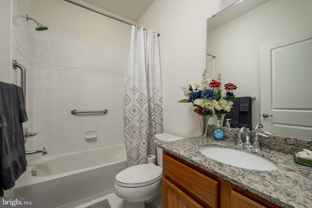 full bathroom featuring vanity, shower / tub combo, and toilet