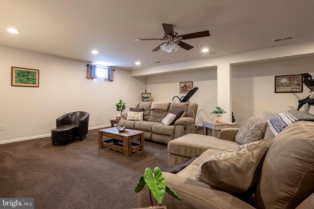 carpeted living room with ceiling fan