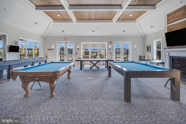 playroom featuring billiards, a wealth of natural light, beam ceiling, and french doors