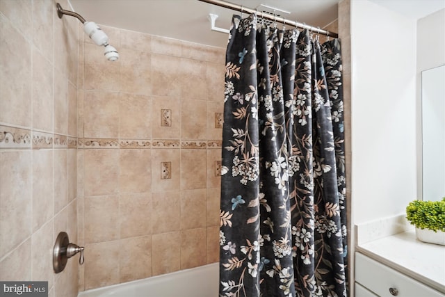 bathroom with vanity and shower / tub combo