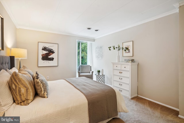 carpeted bedroom featuring ornamental molding