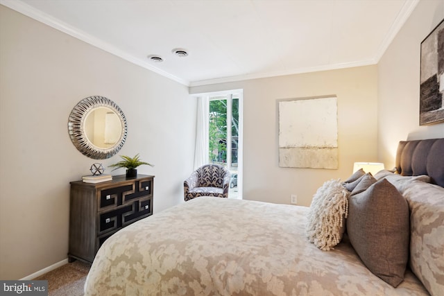 carpeted bedroom with ornamental molding