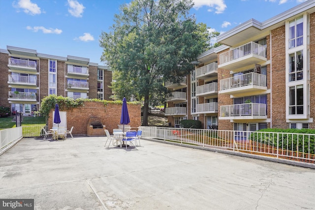 view of property's community with a patio area