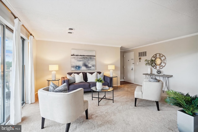 living room with crown molding and light colored carpet