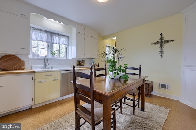 dining space with sink