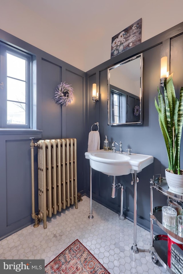 bathroom featuring radiator