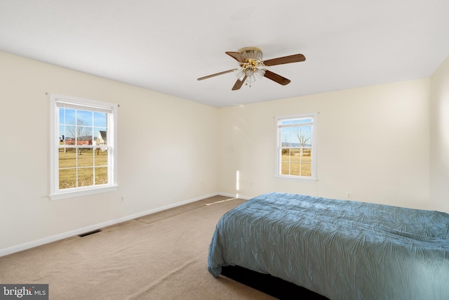 bedroom featuring carpet floors and ceiling fan