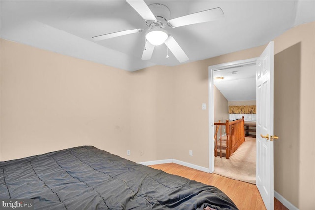 bedroom featuring ceiling fan and hardwood / wood-style floors