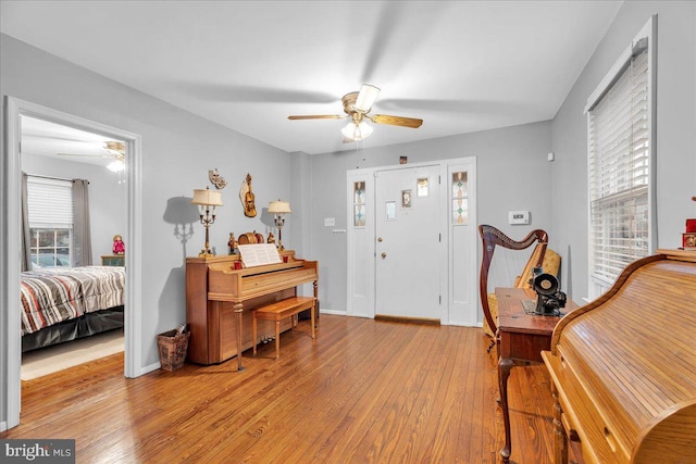 foyer featuring light hardwood / wood-style floors and ceiling fan