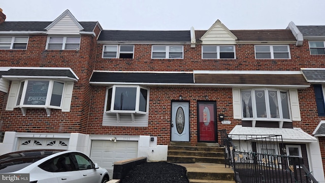 view of property with a garage