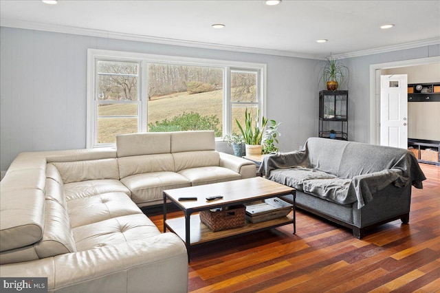 living room with recessed lighting, crown molding, and wood finished floors