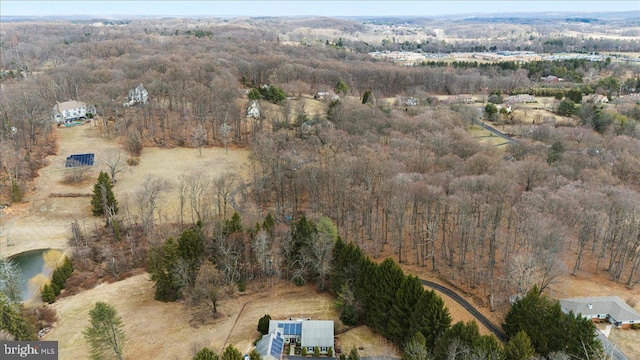 aerial view featuring a forest view