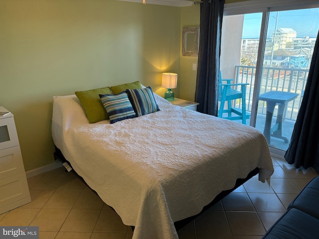 tiled bedroom featuring access to outside