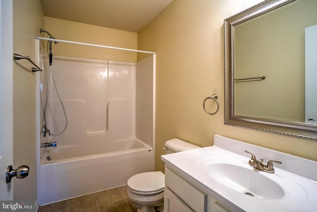 full bathroom with shower / bathing tub combination, vanity, tile patterned floors, and toilet