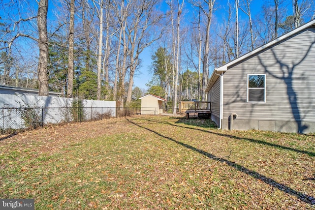 view of yard featuring a deck