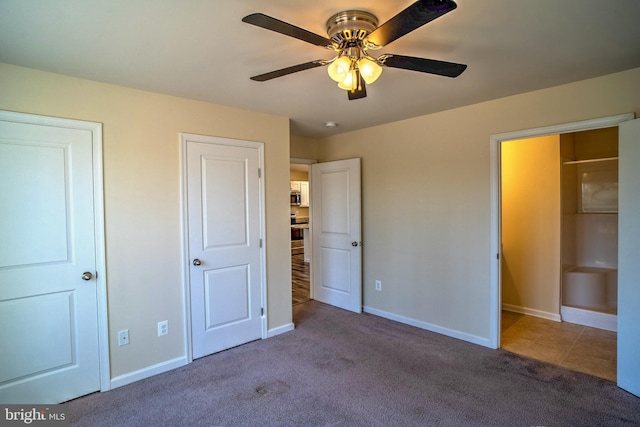 unfurnished bedroom with carpet flooring and ceiling fan