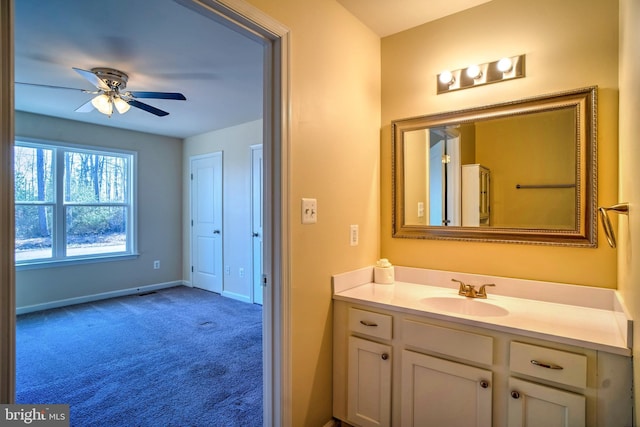 bathroom featuring vanity and ceiling fan