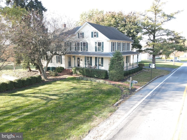 view of front of home with a front lawn