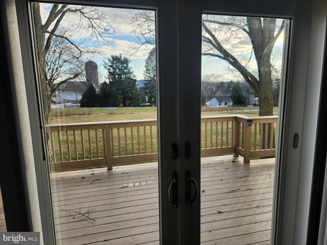 doorway to outside with french doors and a wealth of natural light