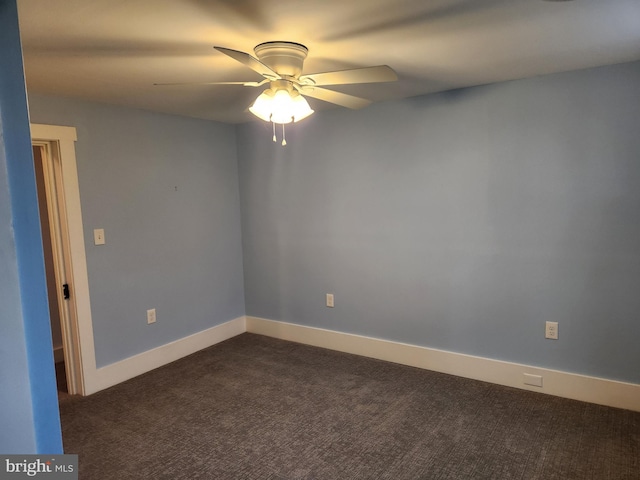 carpeted empty room with ceiling fan