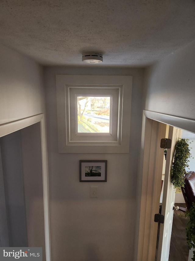 interior details with a textured ceiling