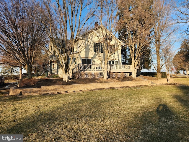 view of yard with a wooden deck