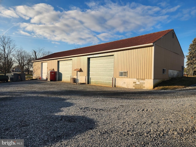 view of outbuilding with a garage