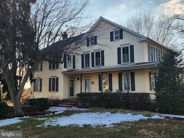 view of front of home featuring covered porch