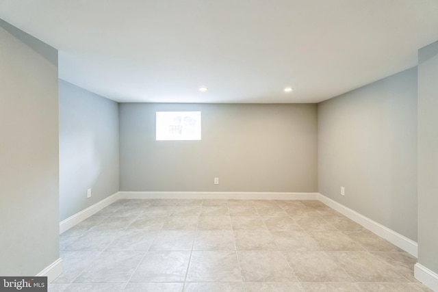 empty room with light tile patterned floors