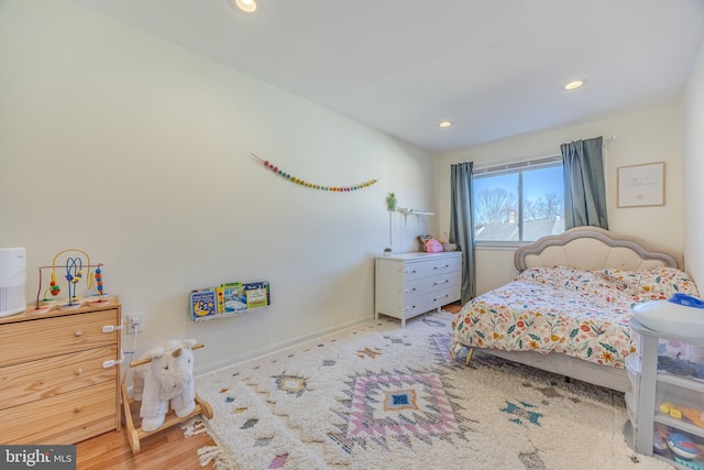 bedroom featuring hardwood / wood-style flooring