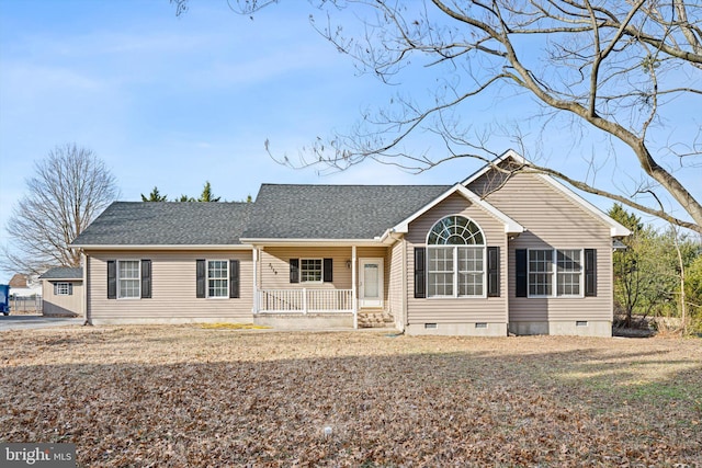 ranch-style home featuring a porch