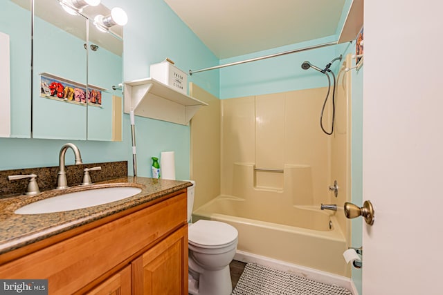 full bathroom with vanity, tub / shower combination, and toilet