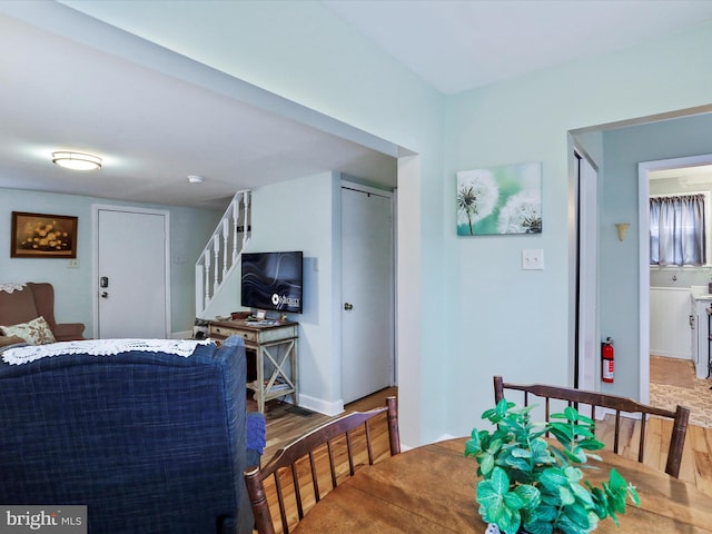 dining area featuring hardwood / wood-style floors