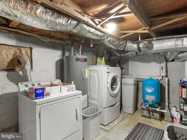 washroom with separate washer and dryer and electric water heater