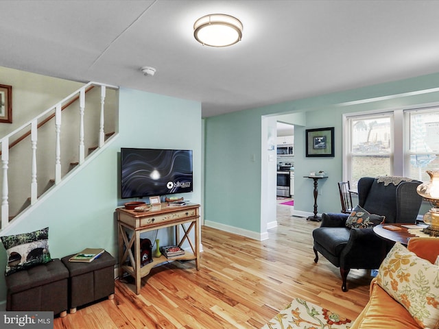 living room with hardwood / wood-style floors