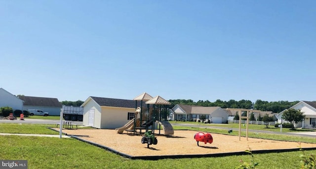 view of jungle gym featuring a yard