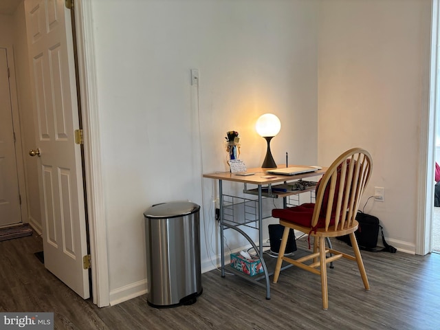 office space with dark hardwood / wood-style flooring