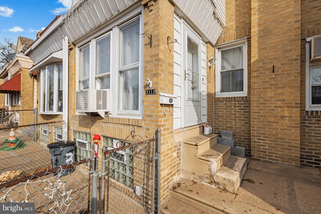 view of home's exterior with cooling unit