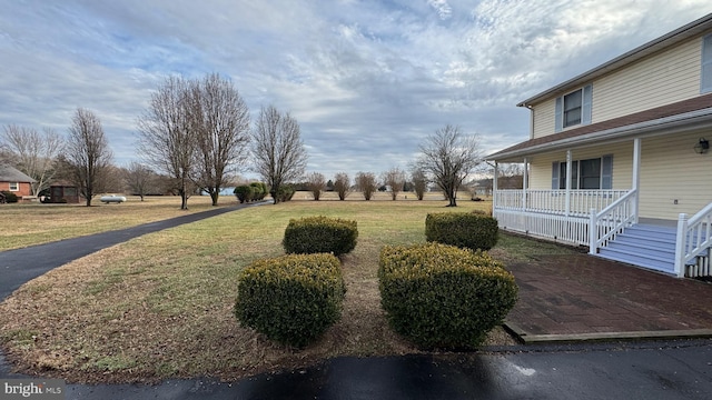 view of yard with a porch