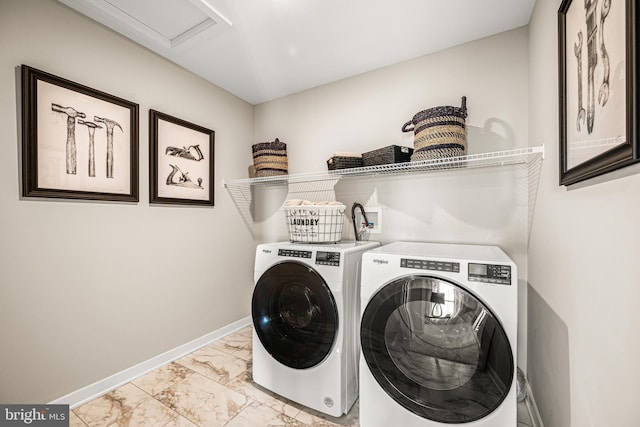 laundry room with independent washer and dryer