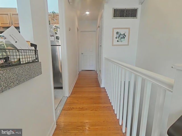 hall featuring light wood-type flooring