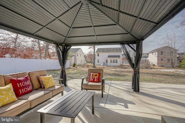 view of patio with a gazebo and an outdoor living space