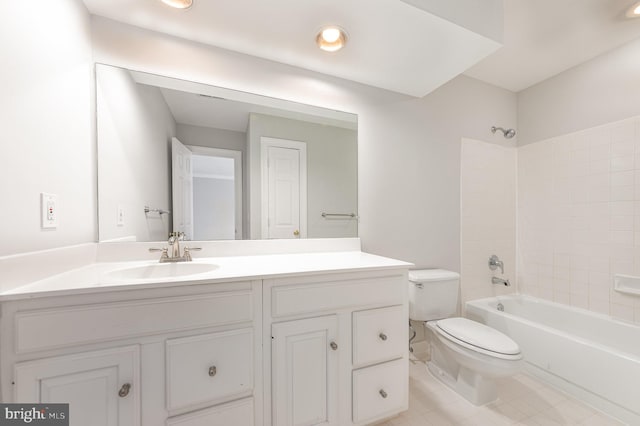 bathroom featuring  shower combination, vanity, and toilet