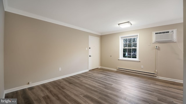 empty room with wood-type flooring, crown molding, a wall mounted air conditioner, and baseboard heating